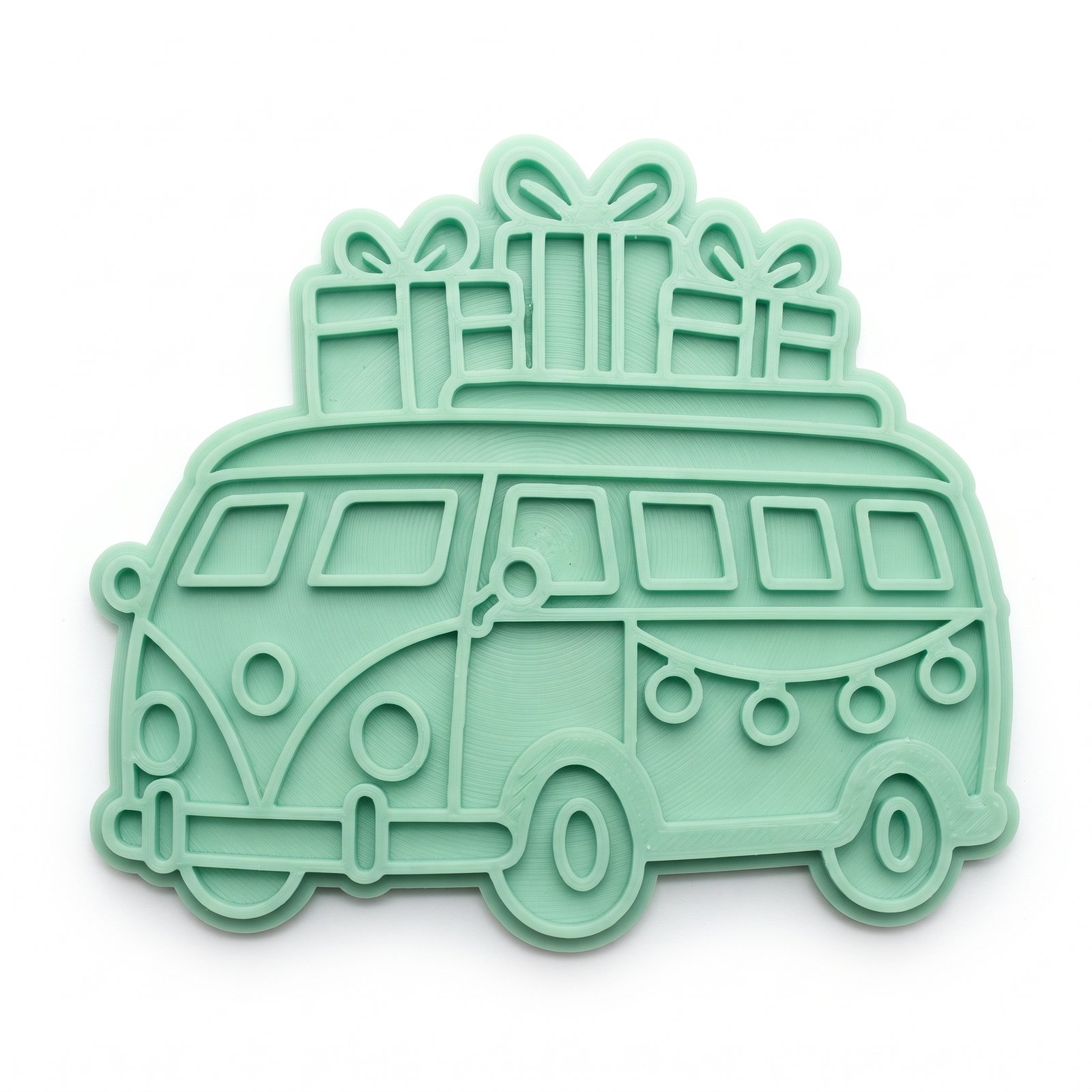 Cortador e marcador verde em formato de Kombi vintage com presentes no teto